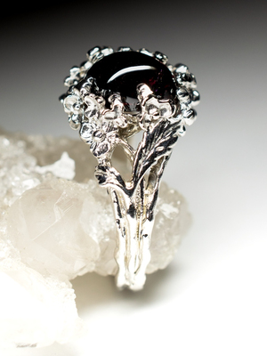 Silver ring with almandine