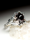 Silver ring with almandine
