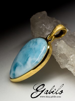 Silver pendant with a larimar in gilding