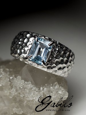 Silver ring with topaz
