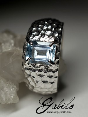 Silver ring with topaz