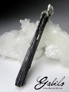Crystal of black tourmaline on a cord