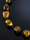 Beads from the tiger's eye