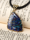 Boulder opal pendant in yellow gold
