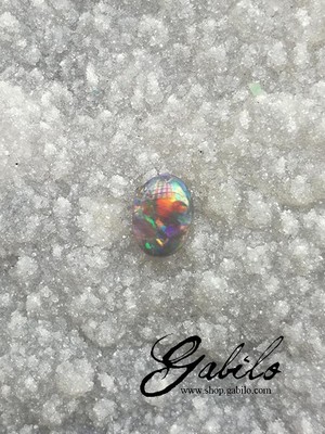 Black opal oval cut 0.74 ct