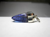 Pendant with tanzanite crystal in gold
