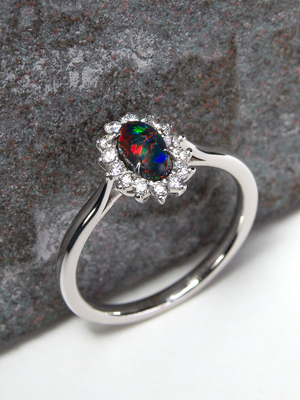 Black opal 14k gold ring with diamonds