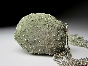 Pyrite nodule on chains