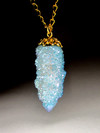 Gold pendant with aquaaurite