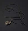 Pendant from meteorite-individual on rubber