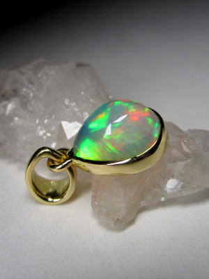 Ethiopian opal gold pendant