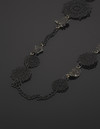 Necklace from meteorites with metal lace