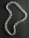 Long necklace of transparent glass beads