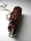 Two-sided pendant transformer with garnet with spessartine