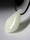 White nephrite on rubber