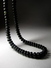 Beads of dark green jade