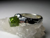 Ring with a crystal of a demantoid