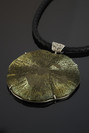 Decoration with a pyrite nodule in silver