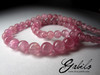 Certified beads from tourmaline with the effect of a cat's eye