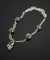 Necklace made of beads and a sample of pyrite mineral