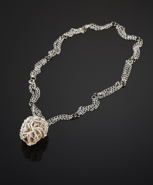 Pendant with a desert rose