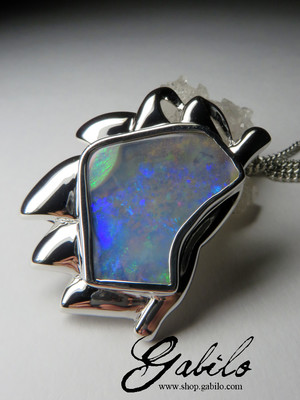 Pendant with boulder opal sun