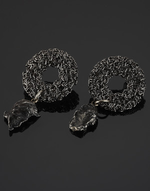 Earrings with meteorites on steel elements