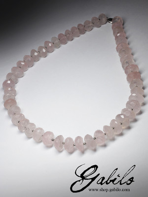 Large beads of pink quartz cut