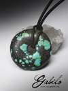 Male pendant with turquoise disc of Tibet