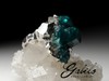 Ring with crystals of dioptase on the rock