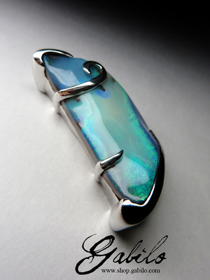 Silver pendant with boulder opal