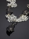 Decoration of 3 meteorites on white chains