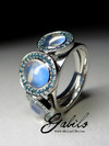 Moonstones gold ring with blue diamonds