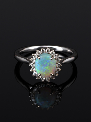 Opal gold ring with diamonds