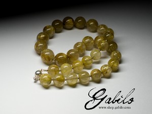 Beads of rutilated quartz