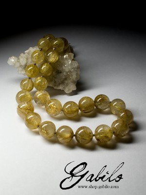 Beads of rutilated quartz