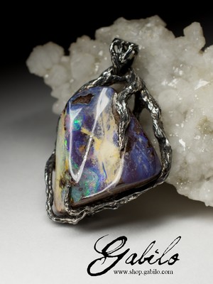 Silver pendant with boulder opal blacking