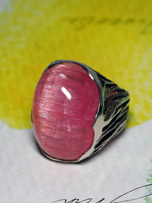Rubellite silver ring with cat's eye effect