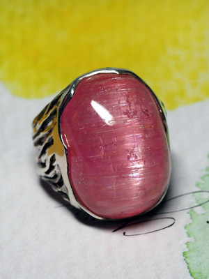 Rubellite silver ring with cat's eye effect