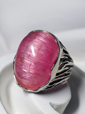Men's rubellite silver ring with cat's eye effect