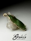 On order: a gold pendant with jade cat's eye