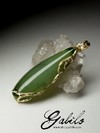 On order: a gold pendant with jade cat's eye
