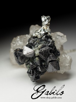 Silver pendant with magnetite