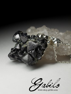 Silver pendant with magnetite