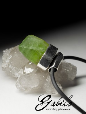 Silver pendant with chrysolite on rubber