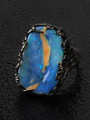 Ivy ring with boulder opal in black gold