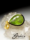 Silver pendant with chrysolite in gilding