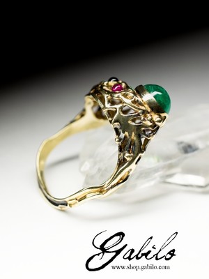 Gold ring with emeralds rubies and sapphires