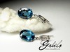 Gold earrings with topaz of London blue and diamonds
