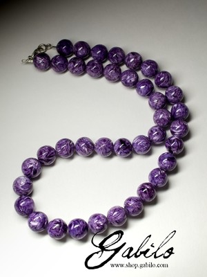 Beads of Charoite variety Extra